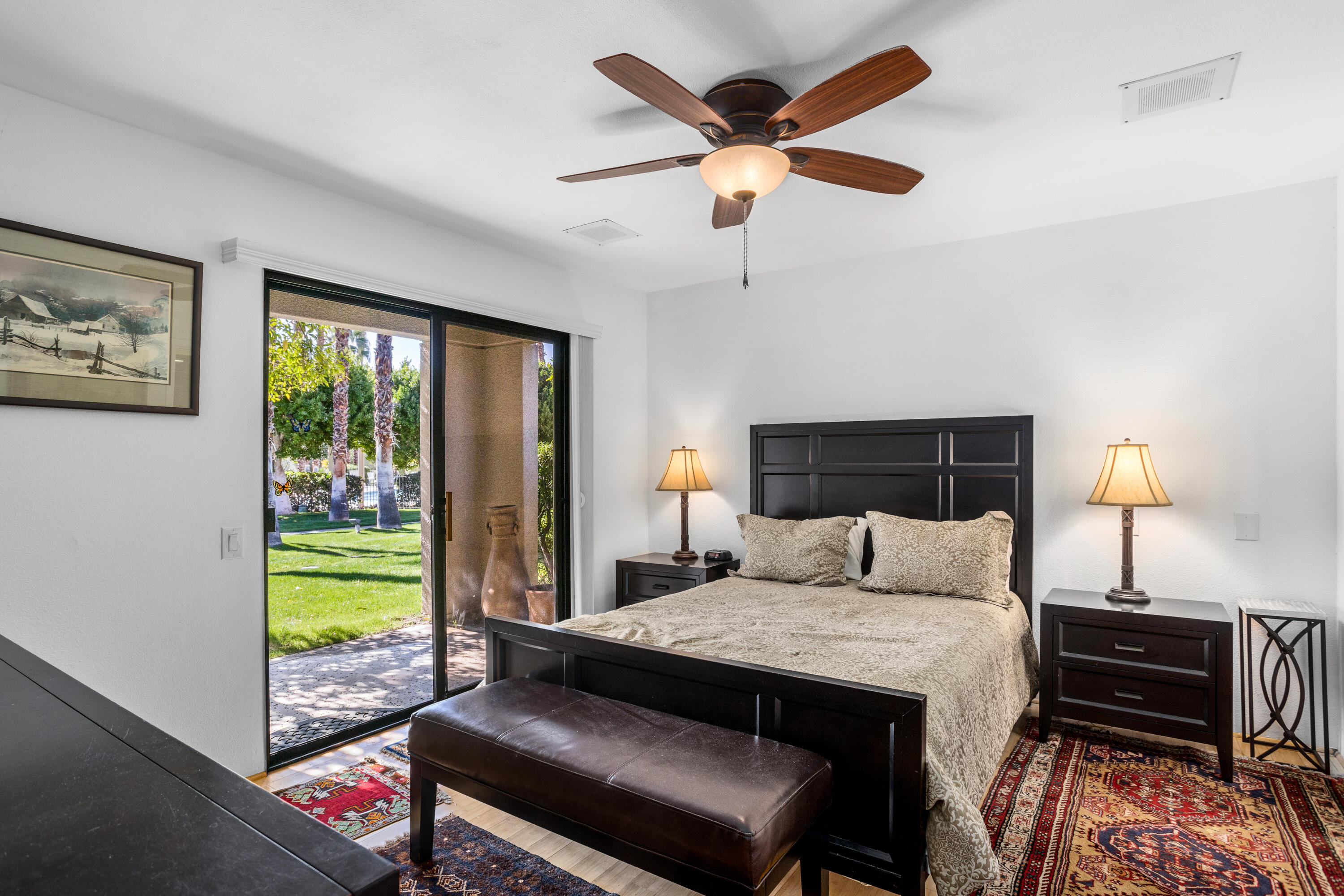 11 Mission Court Rancho Mirage, CA 92270 - Photo 33 of 59 a bedroom with a bed and a window