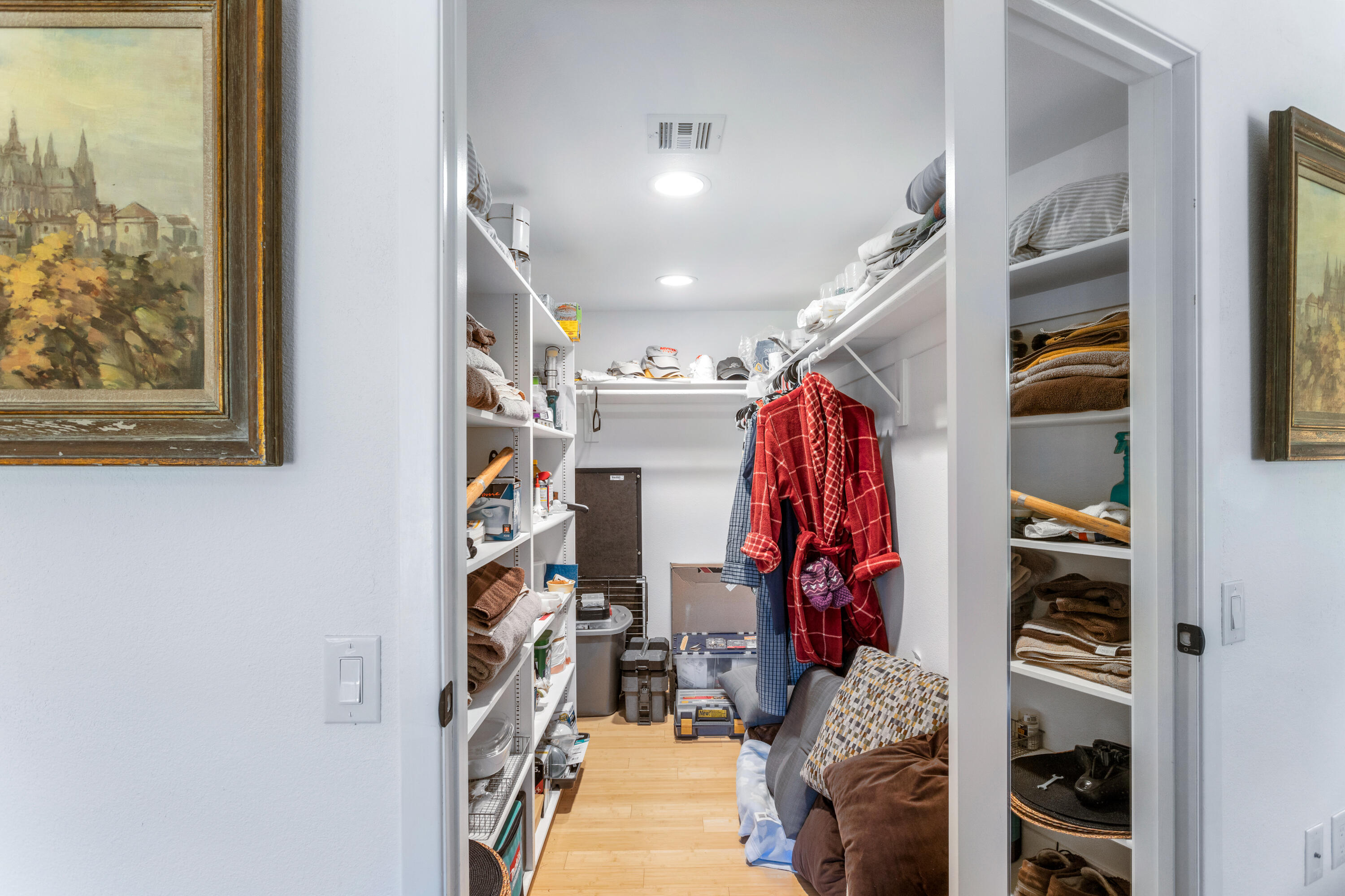 11 Mission Court Rancho Mirage, CA 92270 - Photo 35 of 59 a view of walk in closet with clothes and shoes
