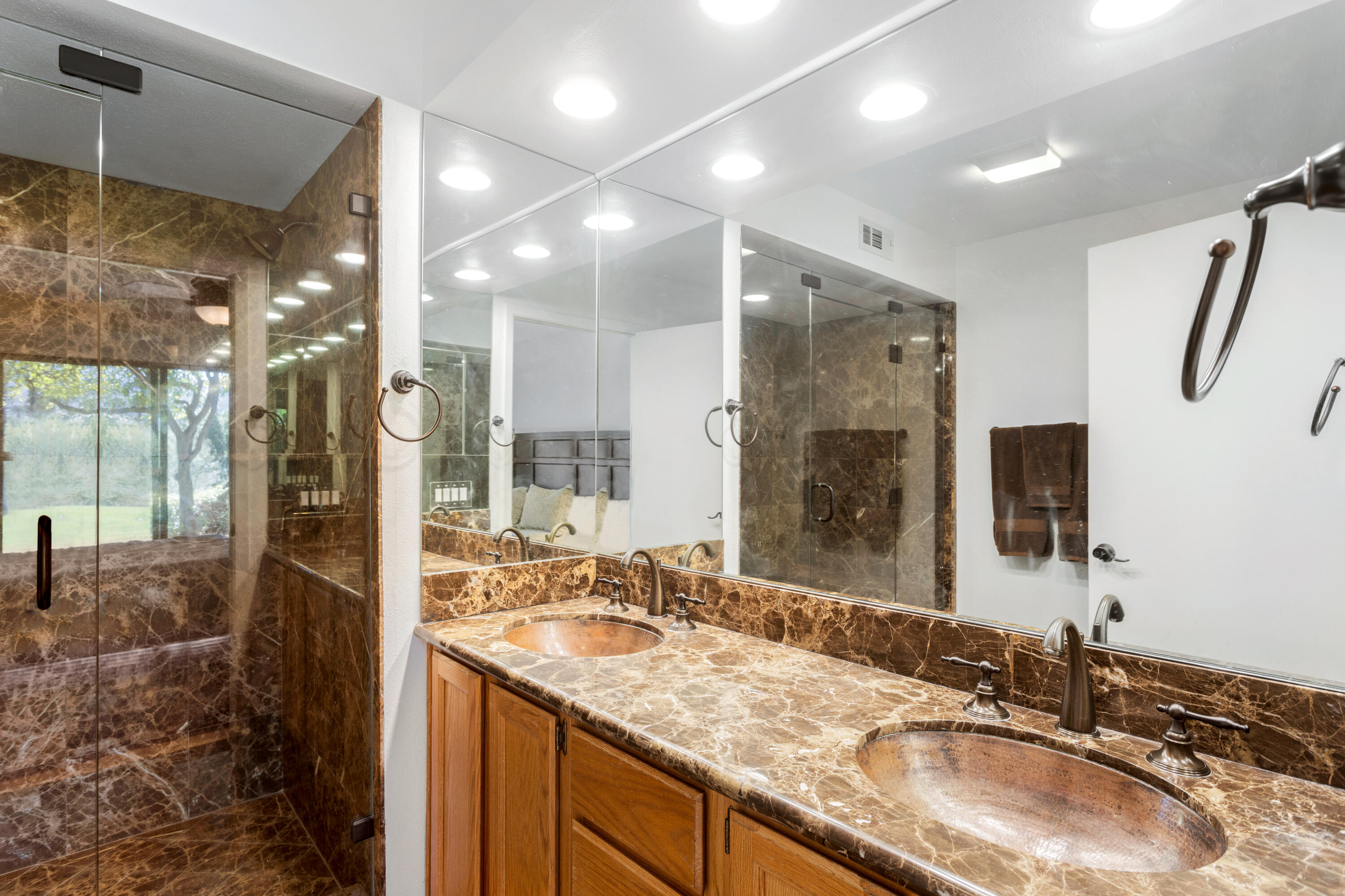 11 Mission Court Rancho Mirage, CA 92270 - Photo 36 of 59 a bathroom with a granite countertop sink mirror and double