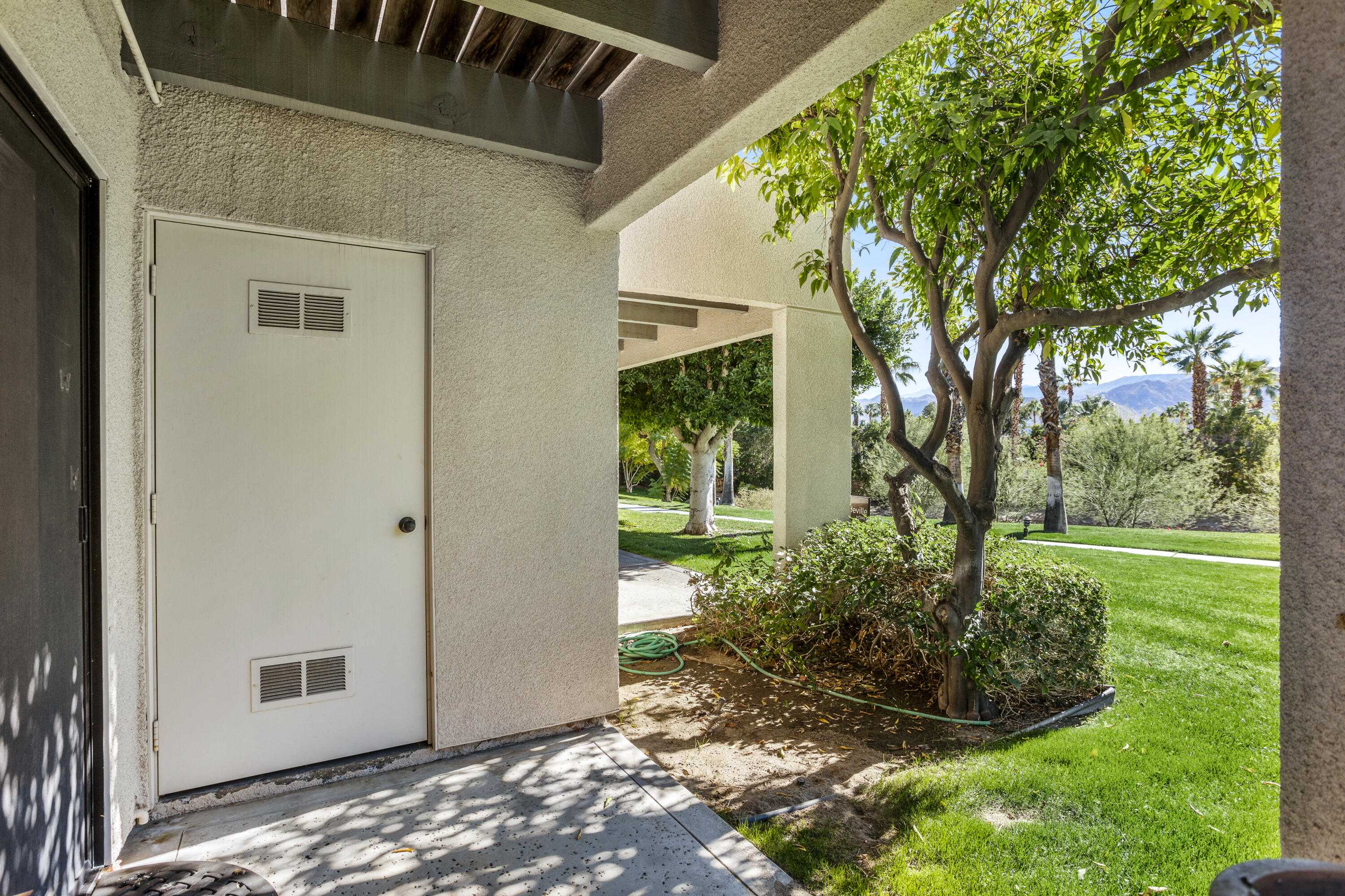 11 Mission Court Rancho Mirage, CA 92270 - Photo 48 of 59 a view of a back yard of the house