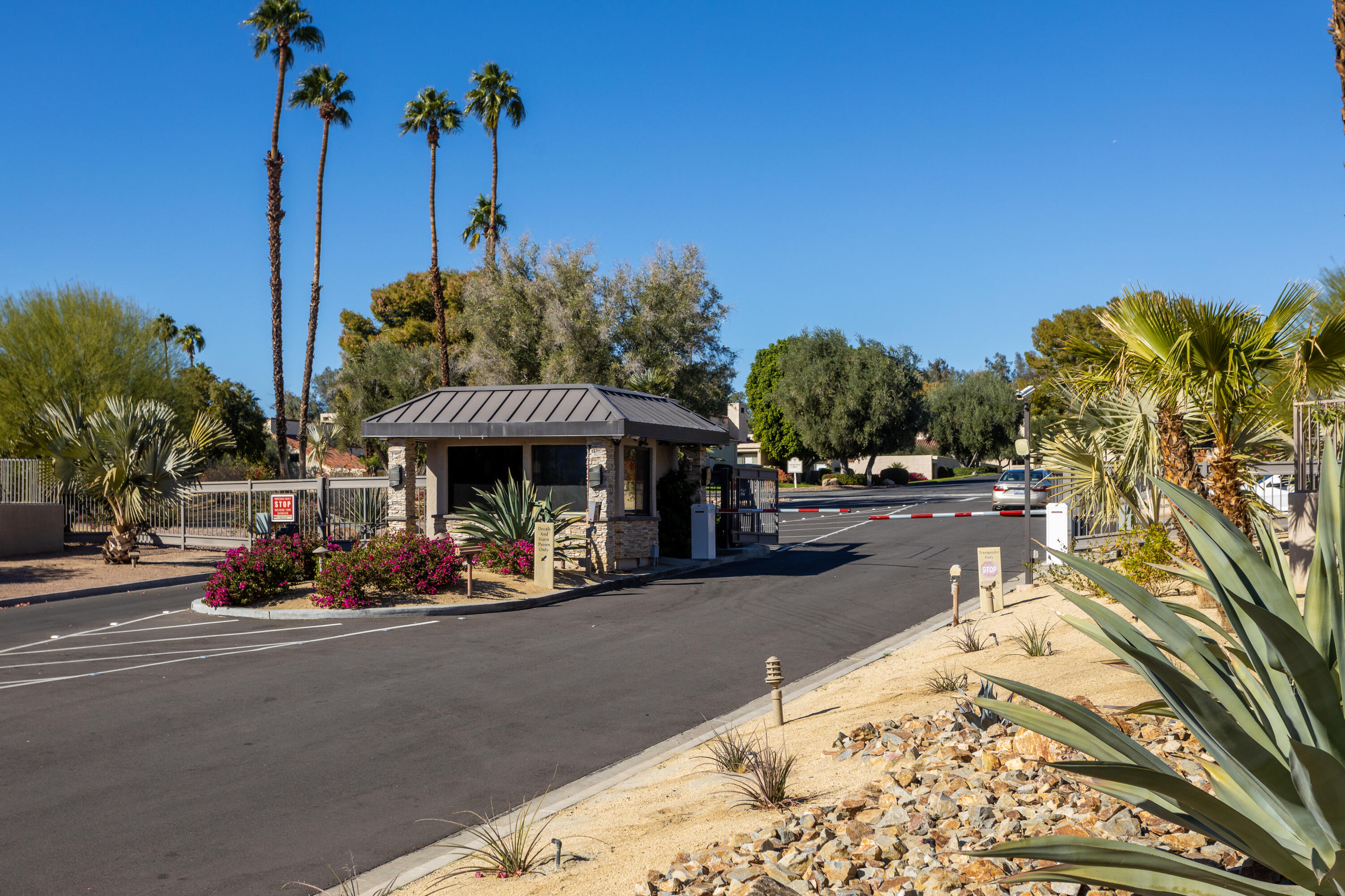 11 Mission Court Rancho Mirage, CA 92270 - Photo 50 of 59 a view of a street with a building in the background