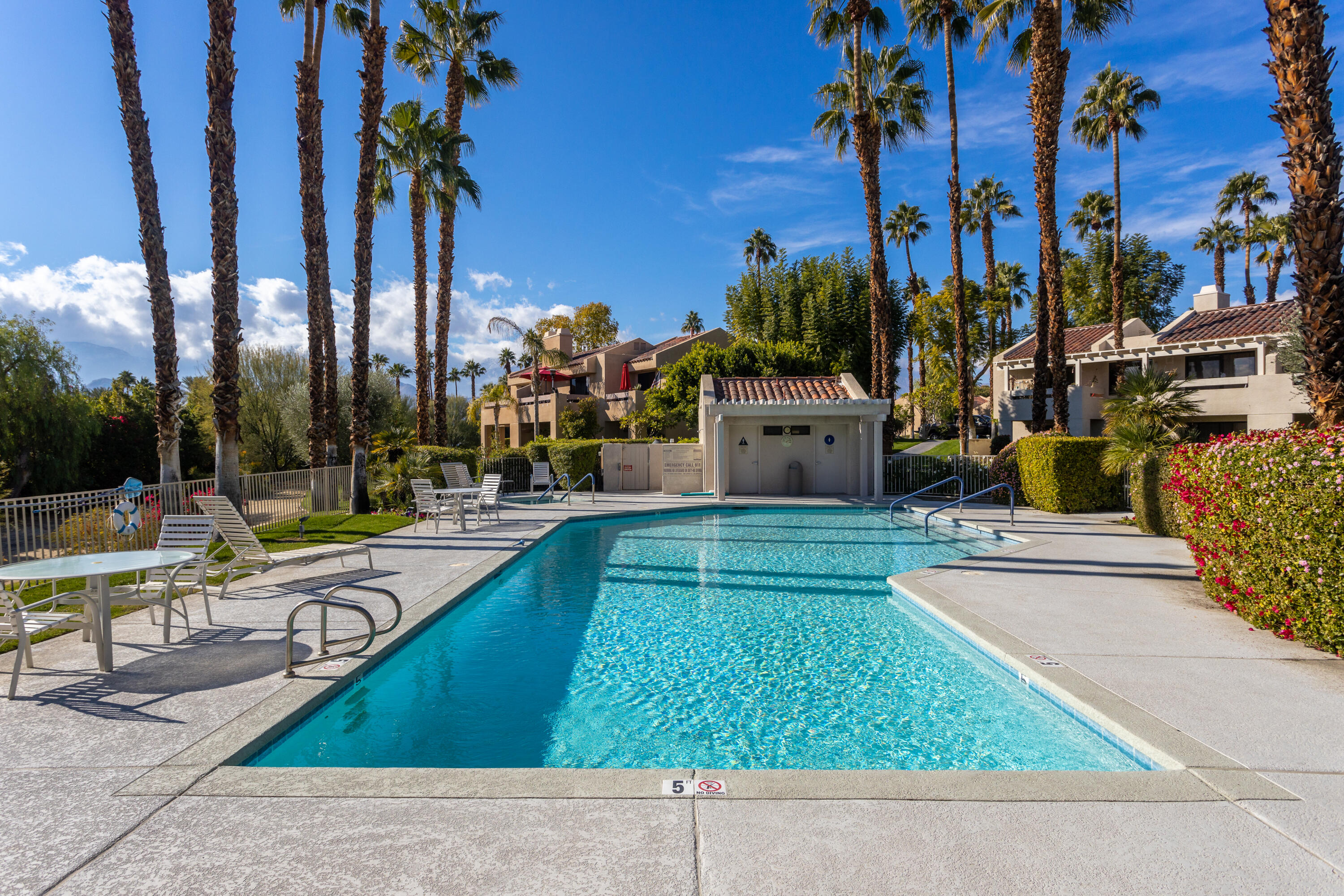 11 Mission Court Rancho Mirage, CA 92270 - Photo 52 of 59 a view of a swimming pool with a patio