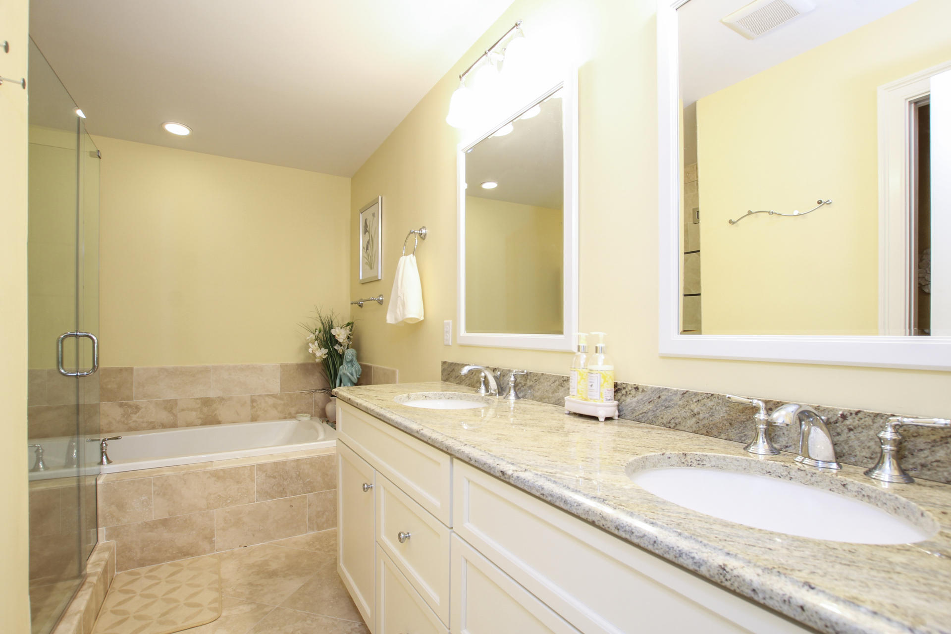 47 Briar Spring Road Orleans, MA 02653 - Photo 13 of 30 a bathroom with a granite countertop bathtub sink vanity and mirror