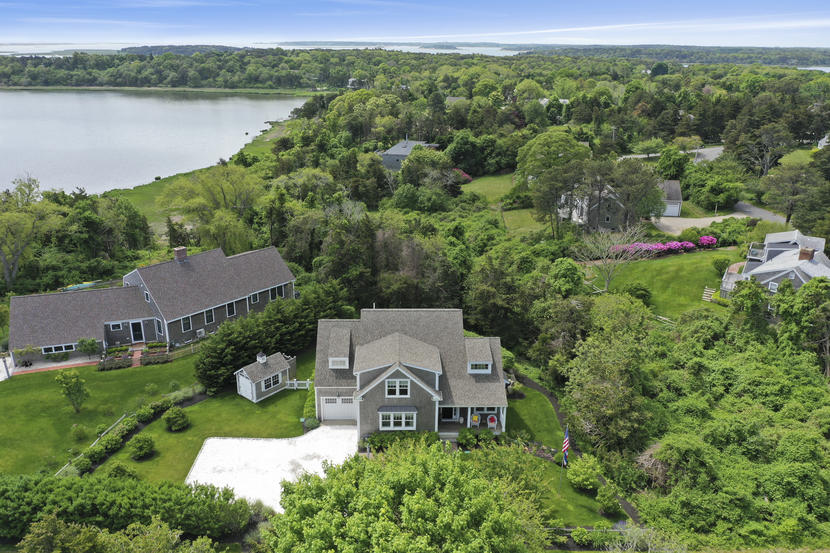47 Briar Spring Road Orleans, MA 02653 - Photo 23 of 30 an aerial view of a house with garden space and a lake view
