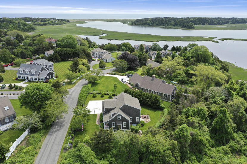 47 Briar Spring Road Orleans, MA 02653 - Photo 4 of 30 an aerial view of a house with a yard and lake view