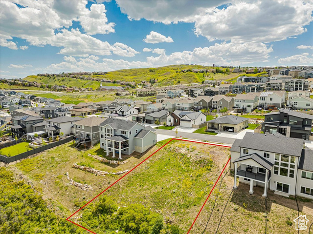 14673 South Ravine Rock Way East, Unit 720 Draper, UT 84020 - Photo 9 of 15 Aerial view of residential area with property boundaries highlighted