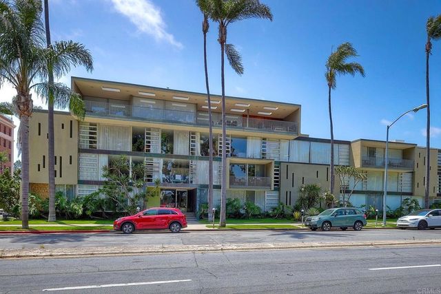 a car parked in front of a building