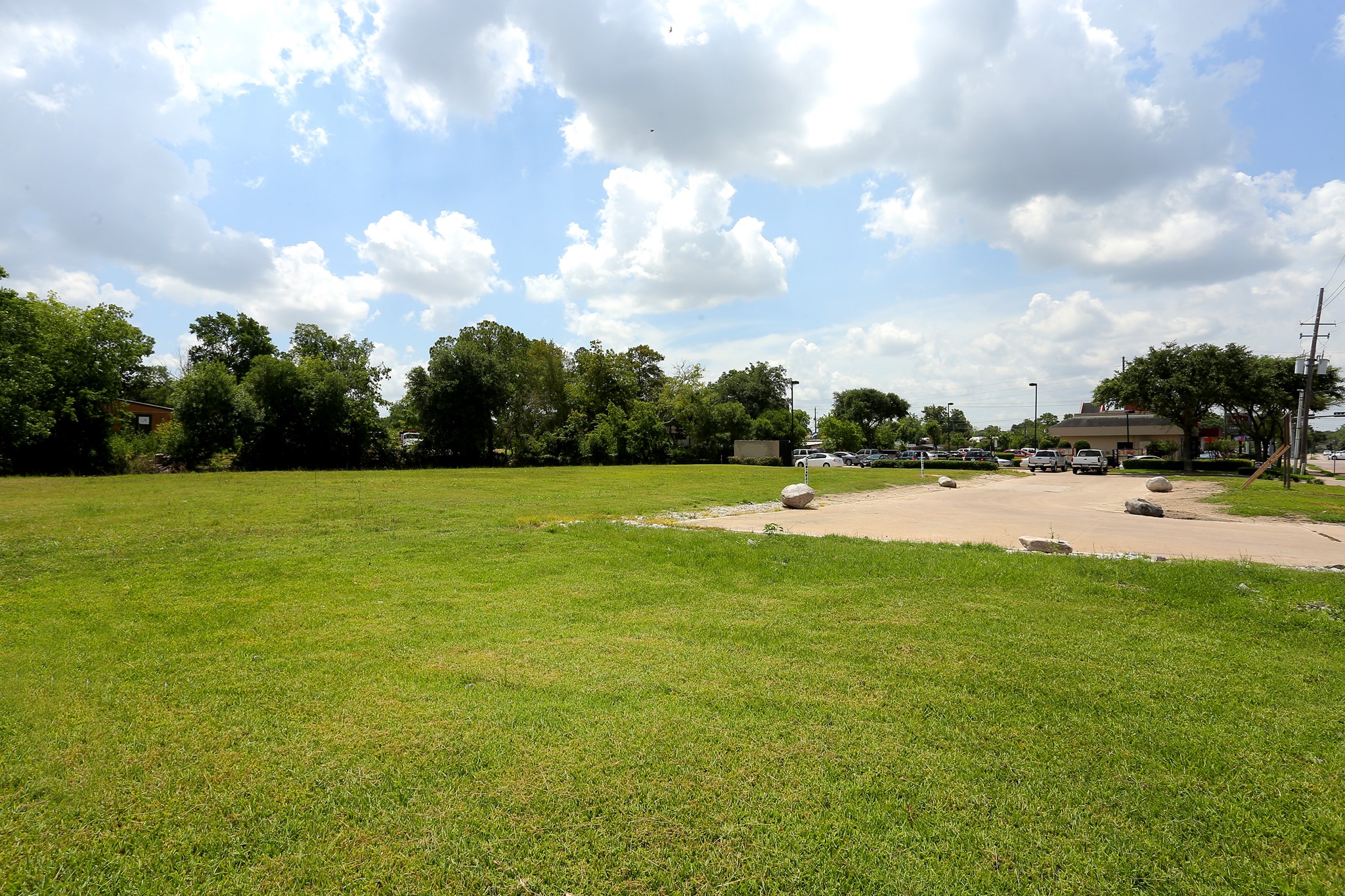 0 Blalock Road Houston, TX 77041 - Photo 3 of 7 a view of a swimming pool and a yard