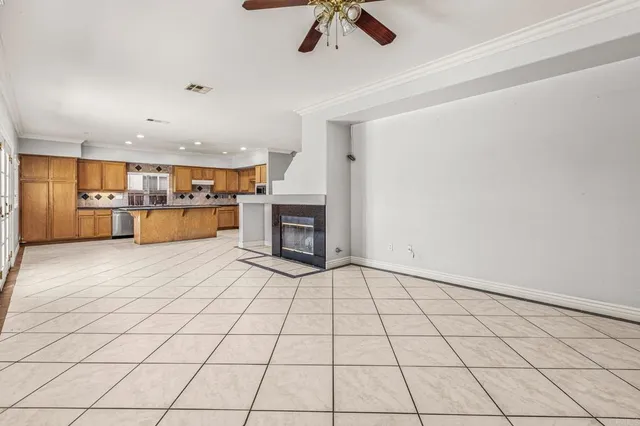 a view of a livingroom and a kitchen