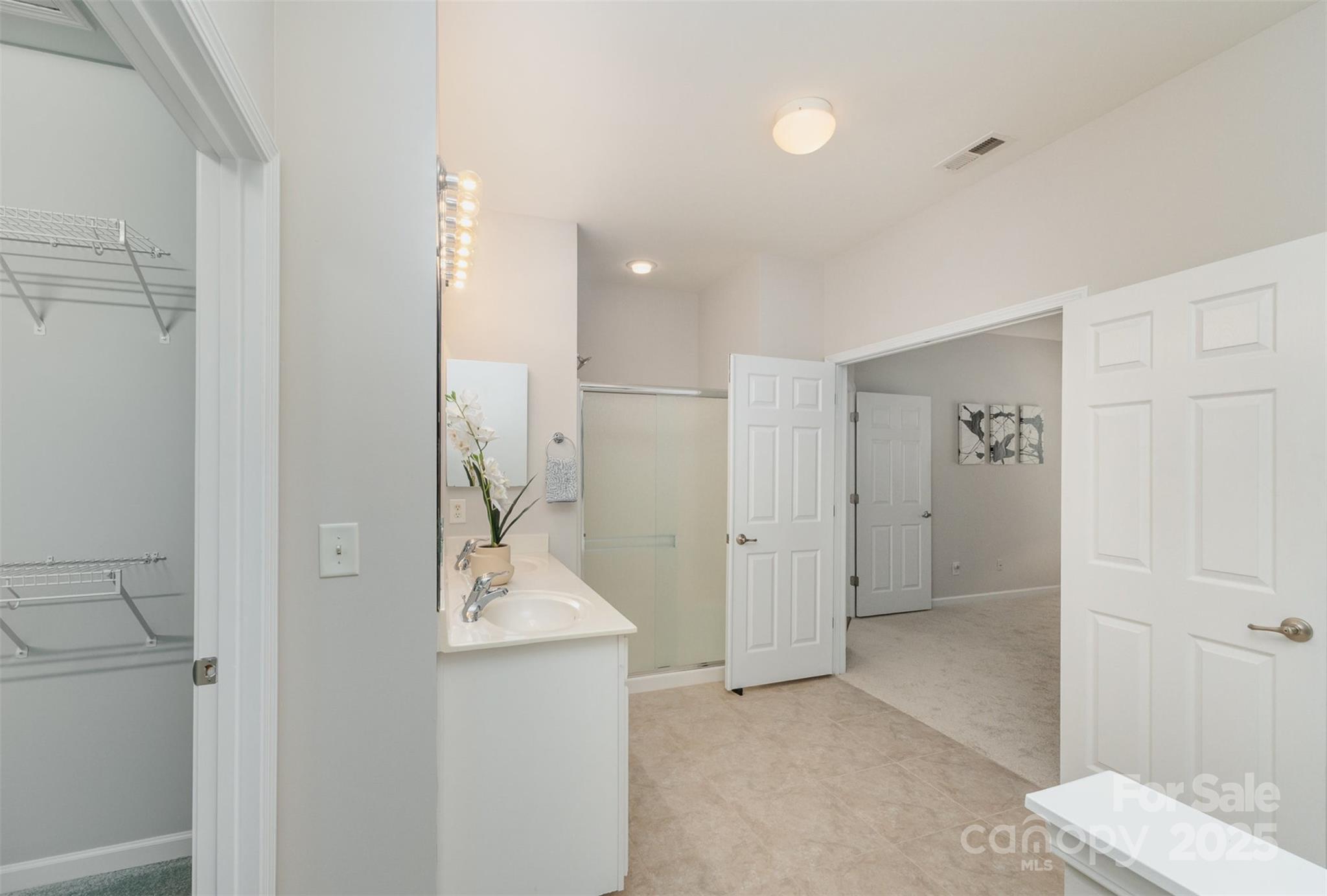 620 Amethyst Circle Fort Mill, SC 29708 - Photo 23 of 32 a bathroom with a sink and mirror