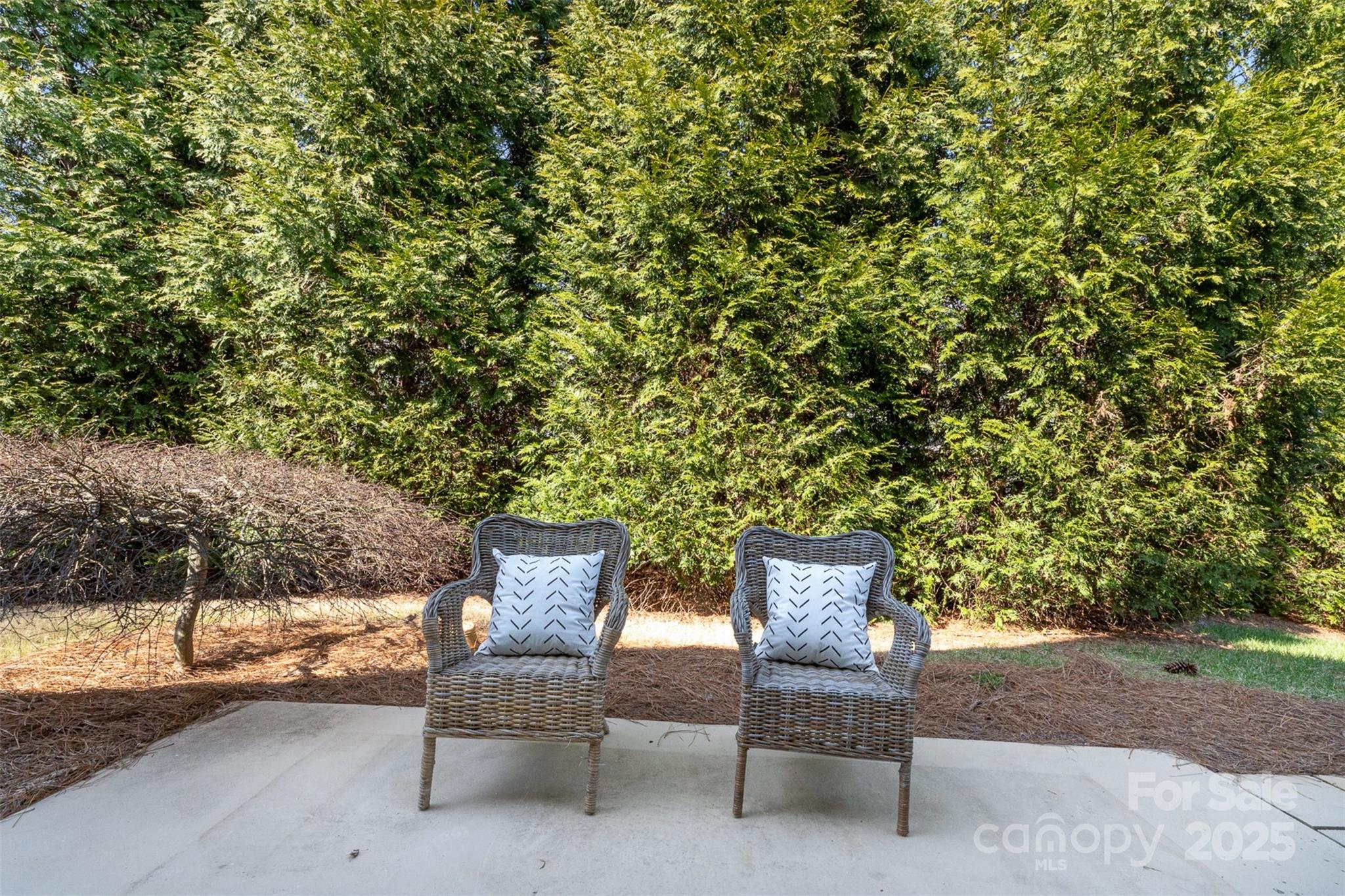620 Amethyst Circle Fort Mill, SC 29708 - Photo 27 of 32 a wooden bench sitting in backyard of a house
