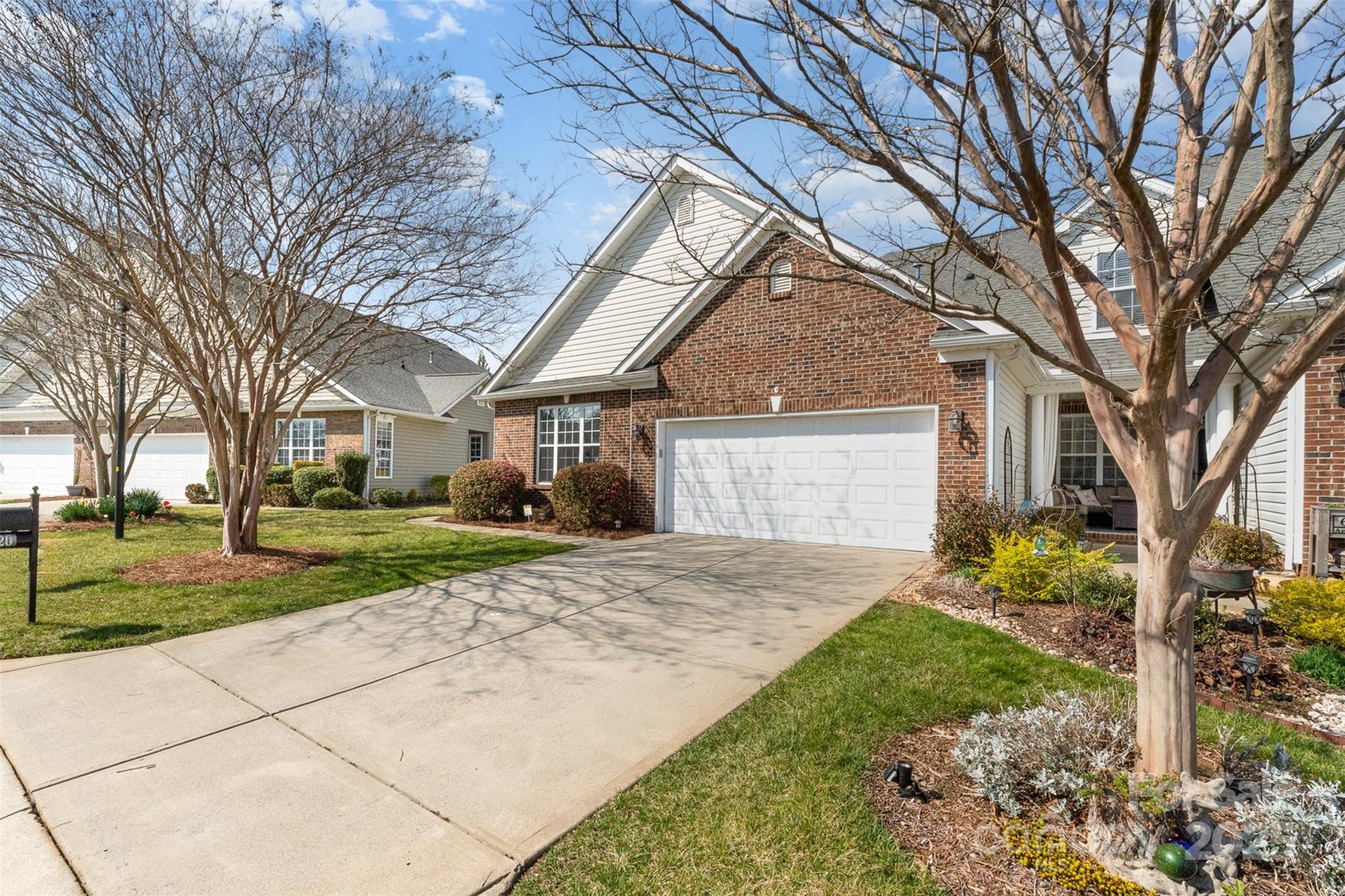 620 Amethyst Circle Fort Mill, SC 29708 - Photo 3 of 32 a front view of a house with garden