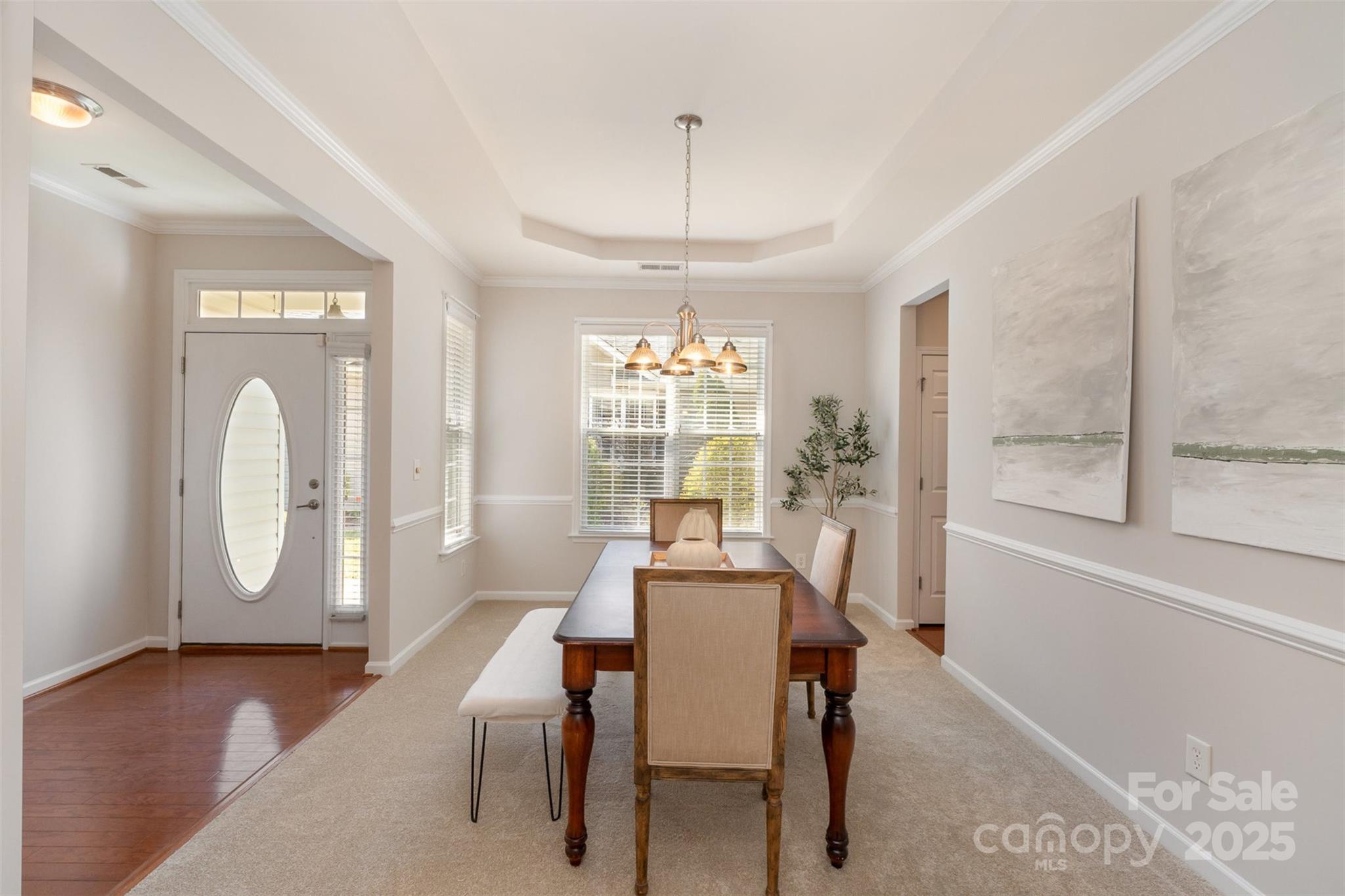 620 Amethyst Circle Fort Mill, SC 29708 - Photo 9 of 32 a view of a dining room with furniture window and wooden floor