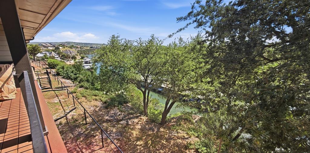 3037 Hells Gate Loop, Unit C208 Strawn, TX 76475 - Photo 5 of 24 a view of a yard