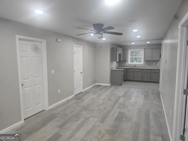 a view of kitchen and windows