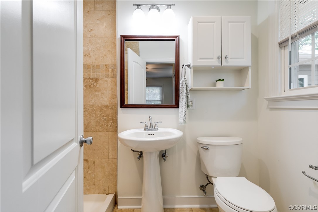 4061 Old Gun Road East Midlothian, VA 23113 - Photo 33 of 42 a bathroom with a toilet sink and mirror