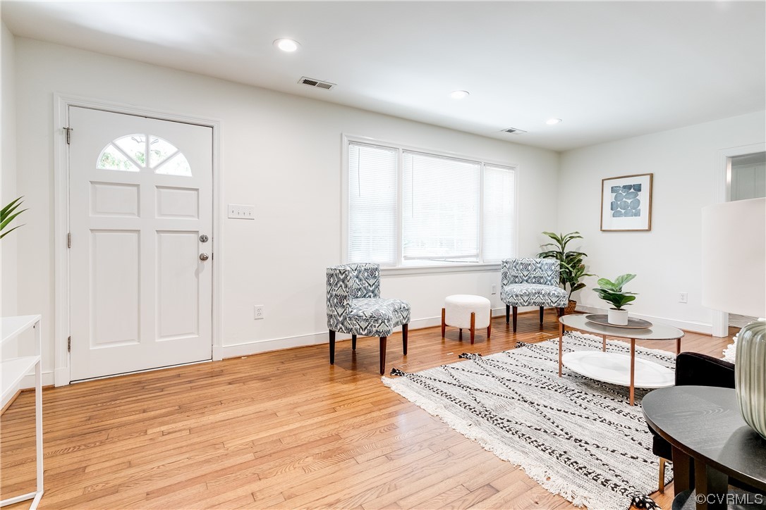 4061 Old Gun Road East Midlothian, VA 23113 - Photo 5 of 42 a living room with furniture wooden floor and dining table