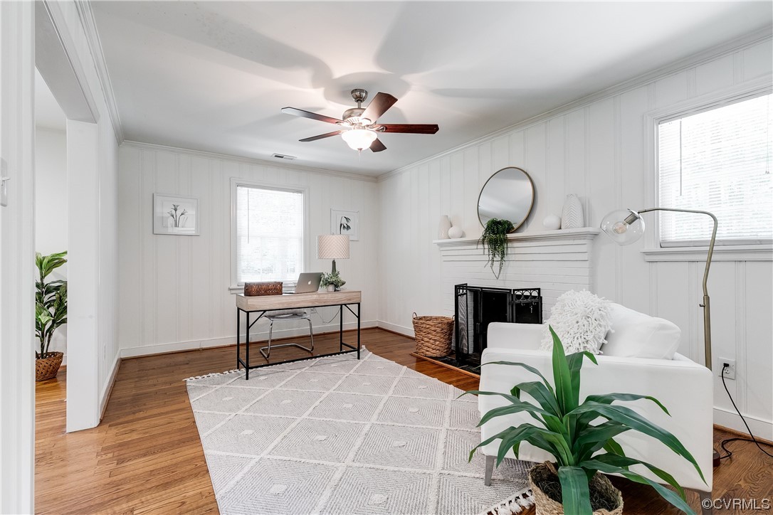 4061 Old Gun Road East Midlothian, VA 23113 - Photo 10 of 42 a living room with furniture a chandelier and a potted plant