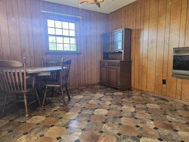 a view of a workspace with furniture