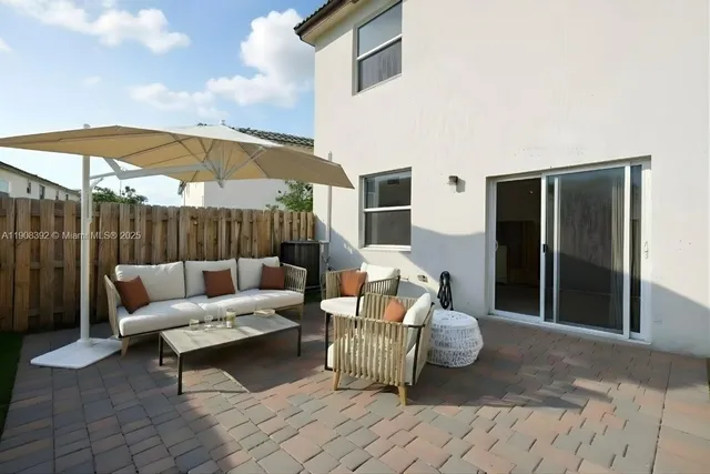 a outdoor space with patio the couch and chairs