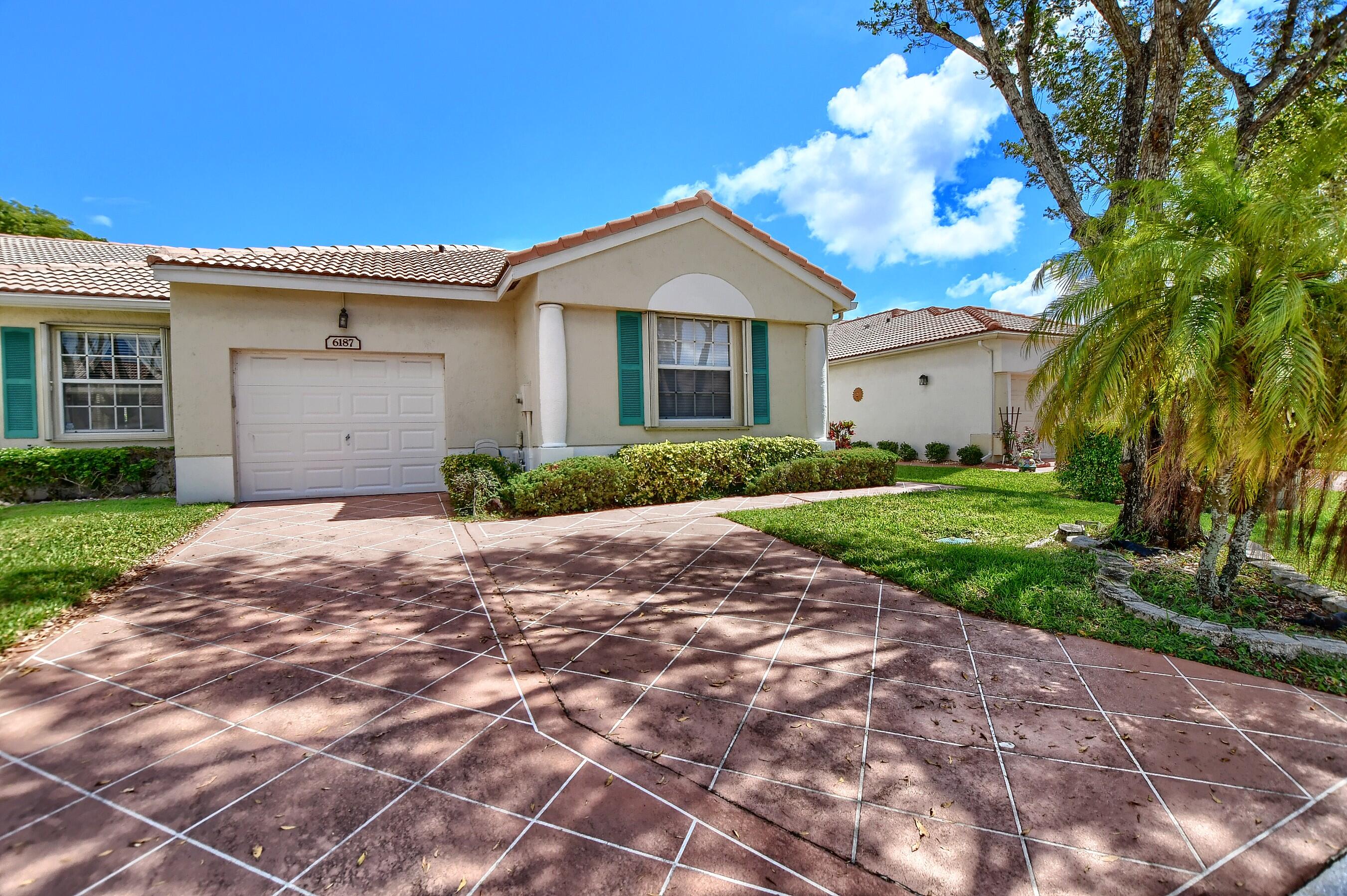 6187 Heliconia Road Delray Beach, FL 33484 - Photo 1 of 55 01_ebf_1000-hdr(5)