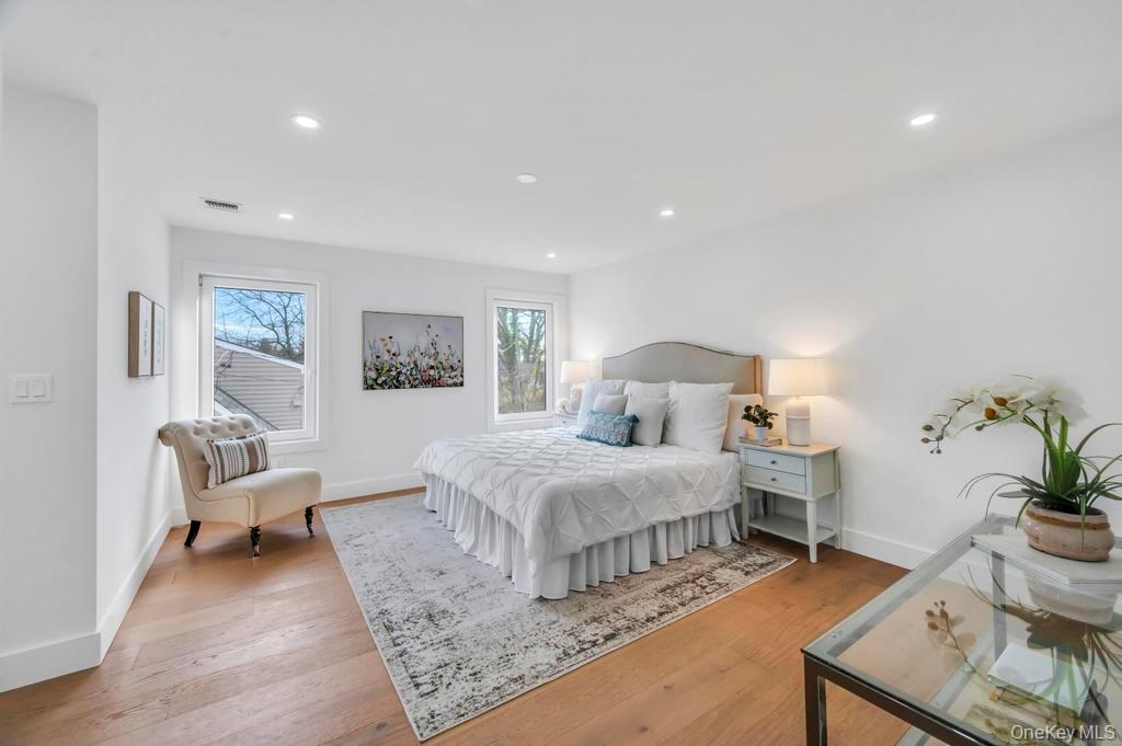 126 Rim Lane Hicksville, NY 11801 - Photo 15 of 28 Bedroom with light wood-type flooring and recessed lighting