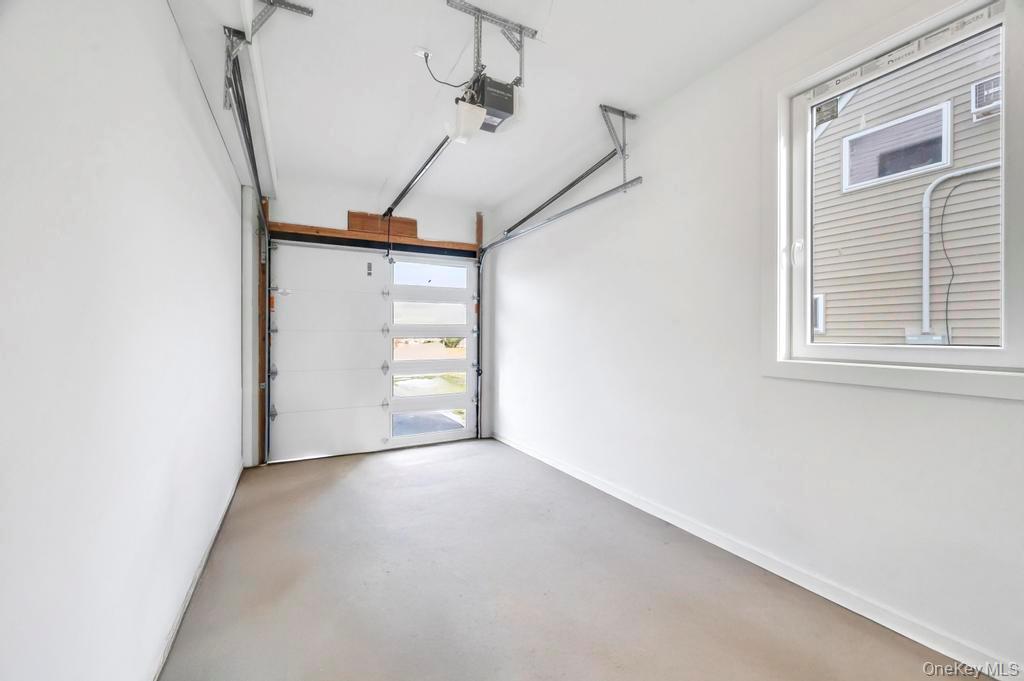 126 Rim Lane Hicksville, NY 11801 - Photo 26 of 28 Garage with a garage door opener