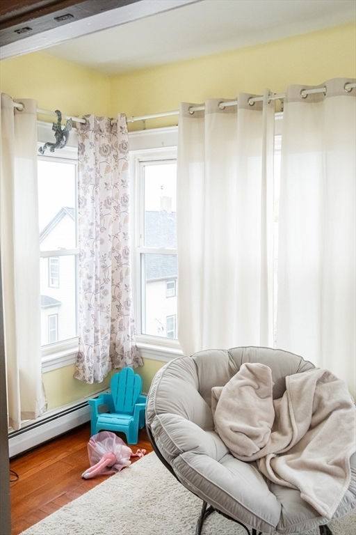 15 Oliver Street Fall River, MA 02724 - Photo 4 of 18 a living room with furniture and a window