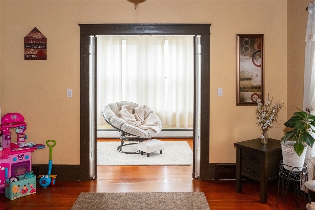 15 Oliver Street Fall River, MA 02724 - Photo 5 of 18 a living room with furniture and a window