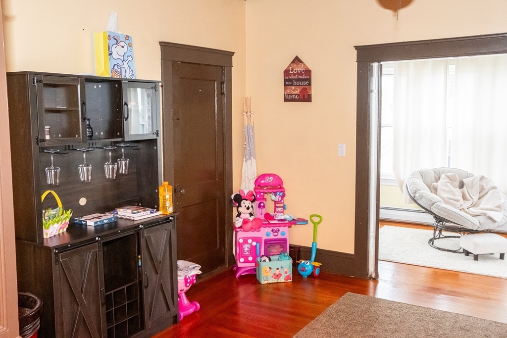 15 Oliver Street Fall River, MA 02724 - Photo 6 of 18 a view of living room with furniture and flat screen tv
