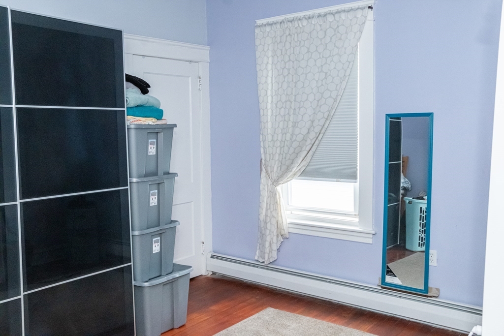 15 Oliver Street Fall River, MA 02724 - Photo 10 of 18 a view of entryway with wooden floor
