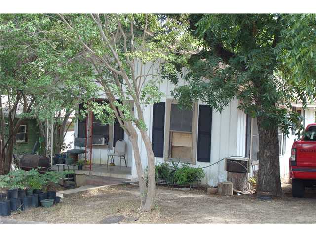 a backyard of a house with seating space