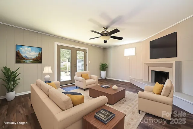 a living room with furniture fireplace and a flat screen tv