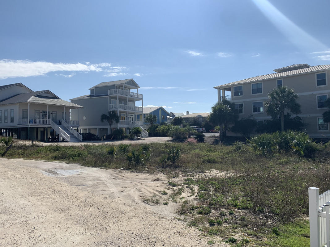 1 Sandy Lane Santa Rosa Beach, FL 32459 - Photo 3 of 5 a view of a big yard in front of a house