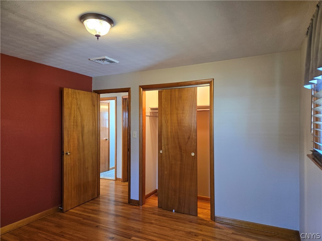 417 Locust Drive Utica, NY 13502 - Photo 11 of 25 Closets with lights in all 3 bedrooms.
