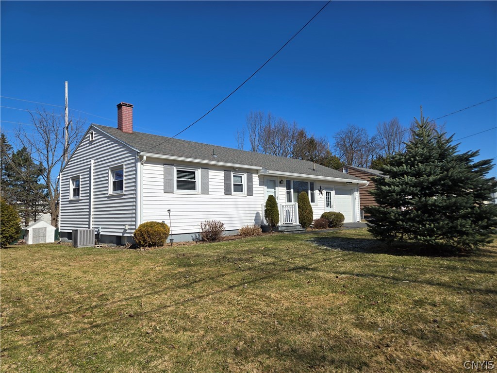 417 Locust Drive Utica, NY 13502 - Photo 24 of 25 Vinyl siding, new roof, new overhead garage door,