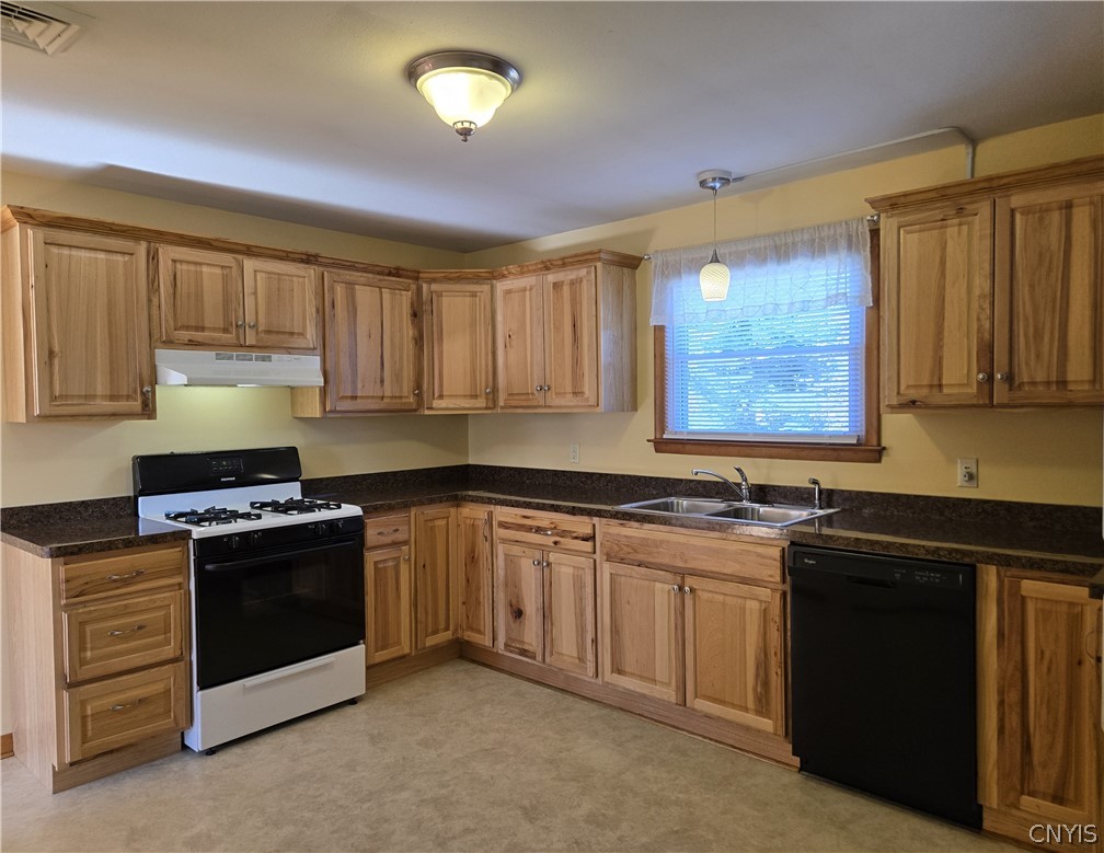 417 Locust Drive Utica, NY 13502 - Photo 6 of 25 The eat-in kitchen has been thoughtfully updated w