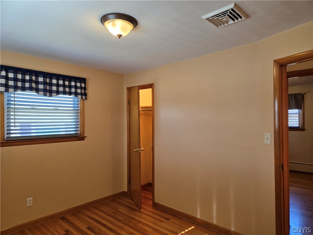 417 Locust Drive Utica, NY 13502 - Photo 8 of 25 The layout is designed to be functional, with bedr