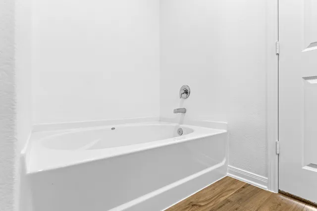 a bathroom with a bathtub