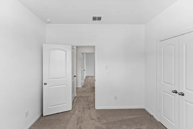 wooden floor and closet in a room