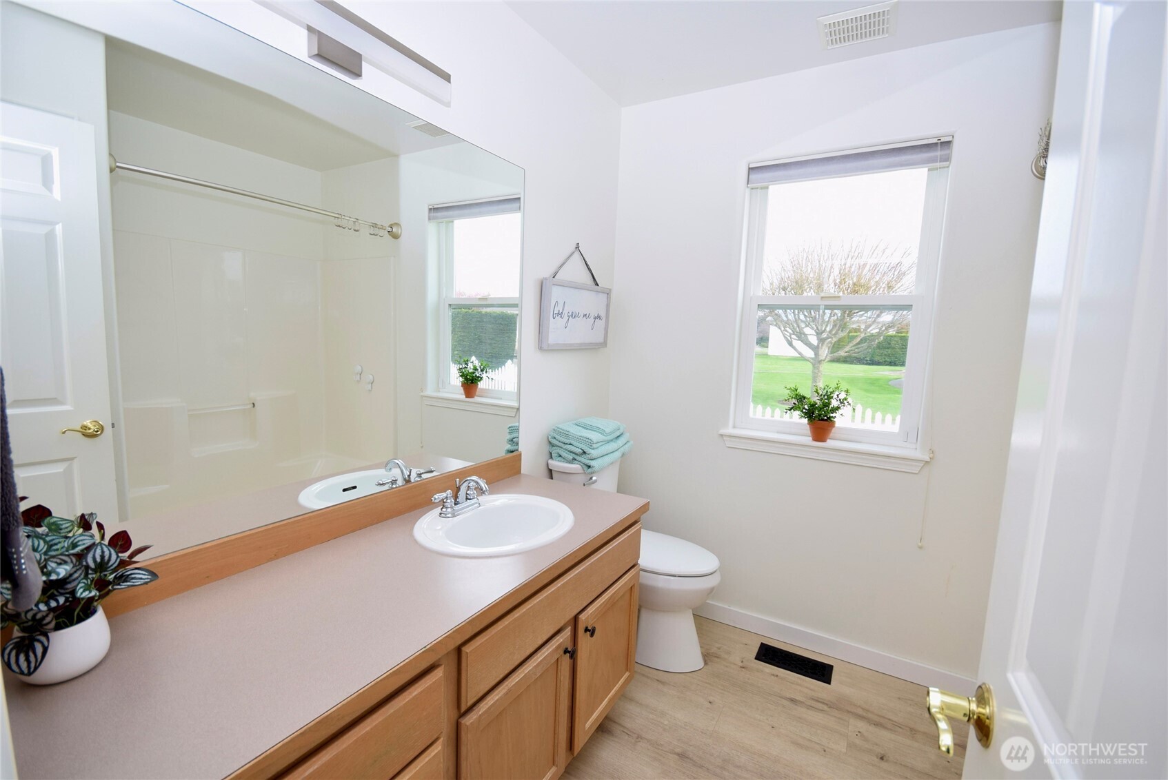 71 John Carl Road Sequim, WA 98382 - Photo 22 of 37 a bathroom with a sink toilet and mirror