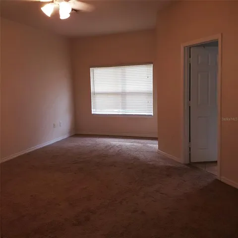 a view of a room that has a window in it
