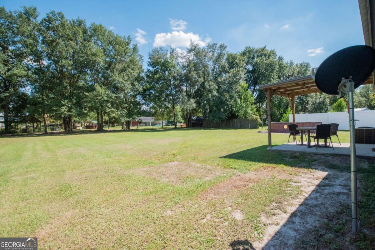 564 Dallas Circle Folkston, GA 31537 - Photo 21 of 21 a view of a yard with an outdoor space