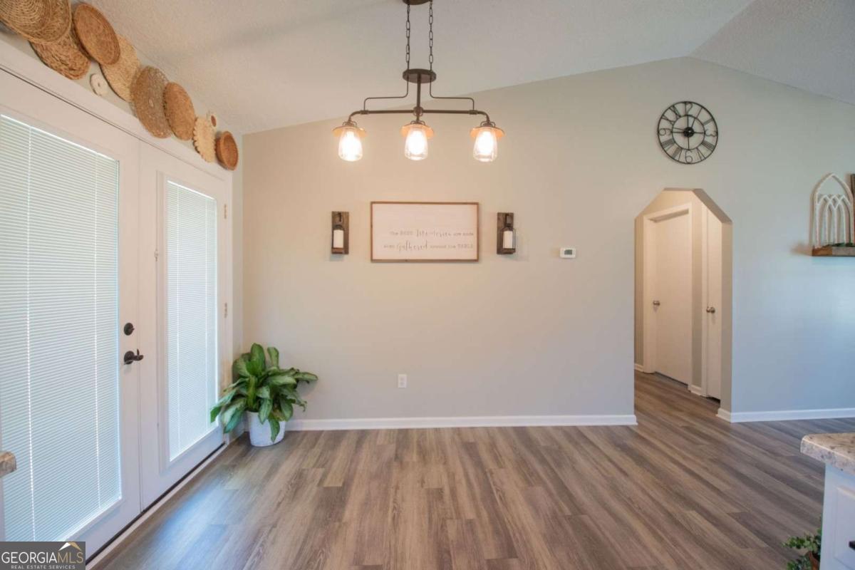 564 Dallas Circle Folkston, GA 31537 - Photo 10 of 21 a view of an entryway with wooden floor