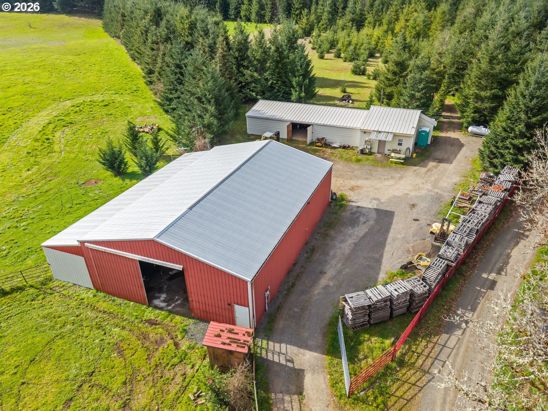 22994 Red Oak Lane Veneta, OR 97487 - Photo 2 of 28 a aerial view of a house with swimming pool