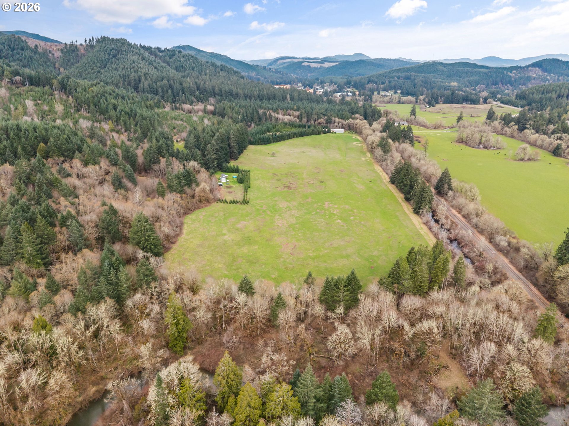 22994 Red Oak Lane Veneta, OR 97487 - Photo 6 of 28 a view of a lake with a mountain