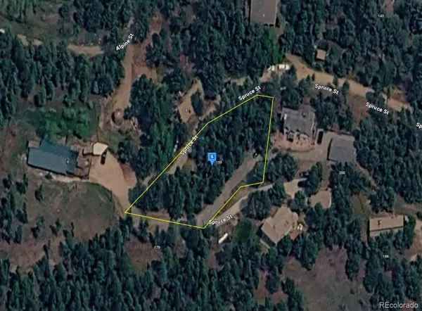 an aerial view of a house swimming pool and outdoor space