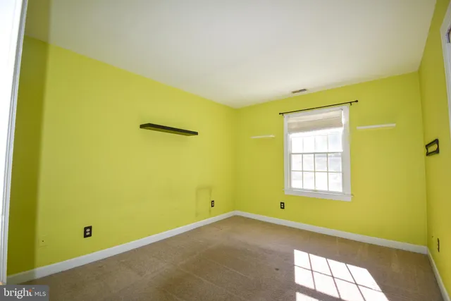 a view of a room with windows