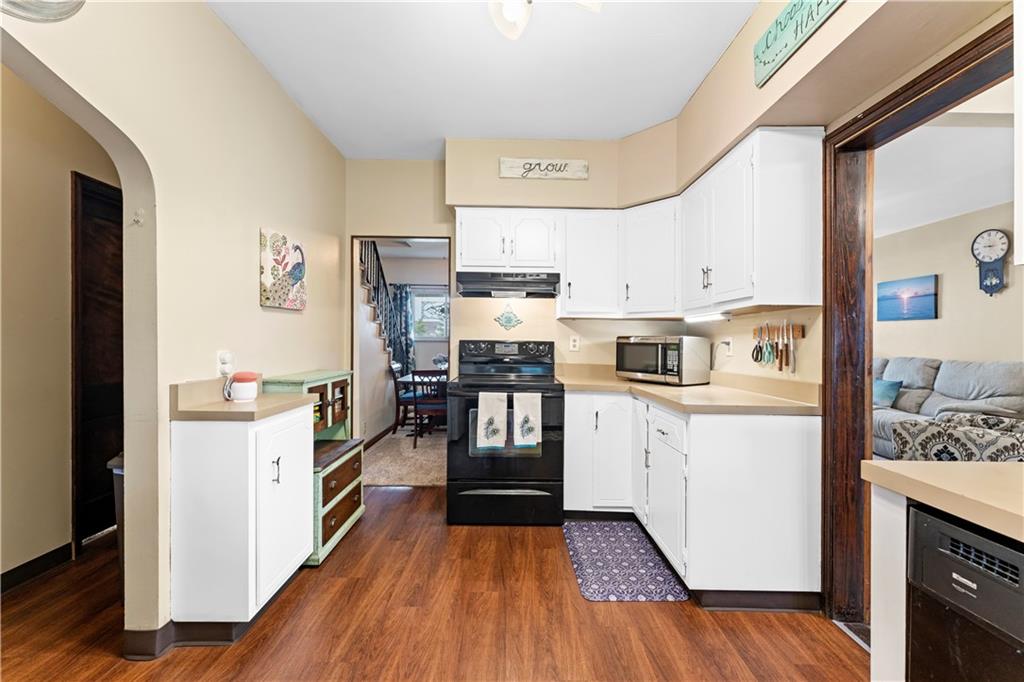 Clean and bright with New Vinyl plank floors.