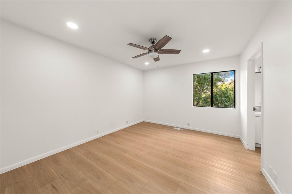 3020 North 43rd Street Waco, TX 76708 - Photo 26 of 40 an empty room with a window and a fan